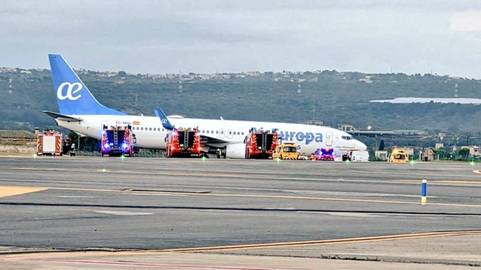 Emergency vehicles surround an Air Europa plane at Palma Airport after a wheel reportedly came off during landing.