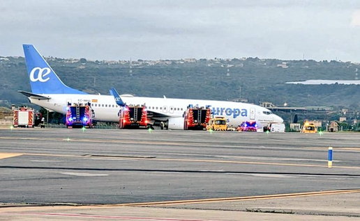 Emergency vehicles surround an Air Europa plane at Palma Airport after a wheel reportedly came off during landing.
