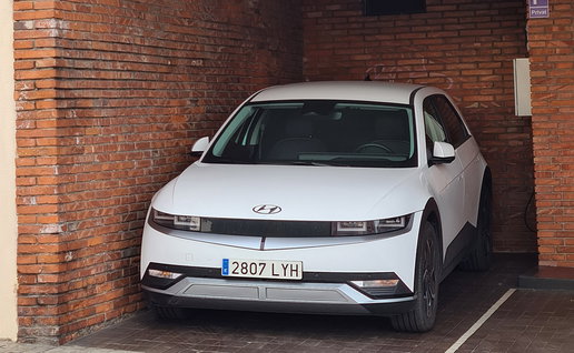 Car parked inside a private garage space in Spain