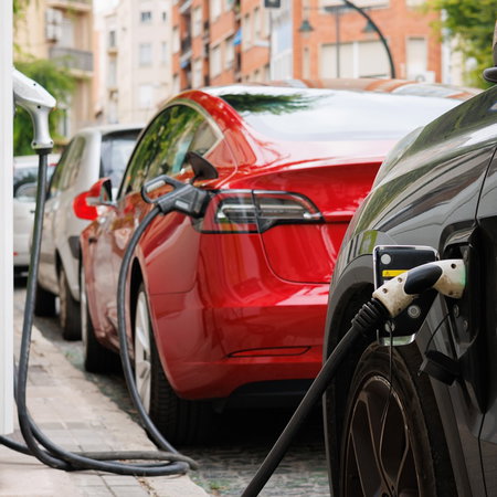 Electric cars charging in Spain as the government launches new grants worth up to €5,500 for buyers.