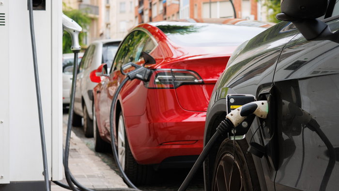 Electric cars charging in Spain as the government launches new grants worth up to €5,500 for buyers.