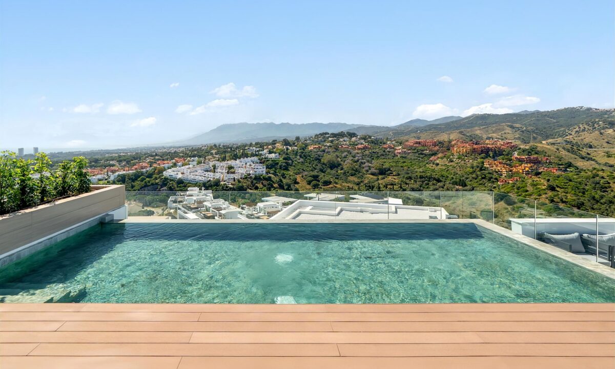 Rooftop infinity pool overlooking the hills of Marbella and the Costa del Sol—a luxury property investment in Spain currently popular with Polish buyers.