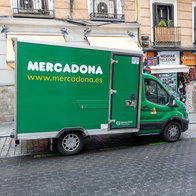 Mercadona delivery van parked outside shops in Spain as the supermarket changes home delivery rules at some stores.