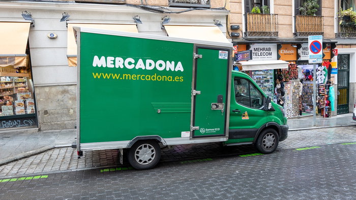 Mercadona delivery van parked outside shops in Spain as the supermarket changes home delivery rules at some stores.