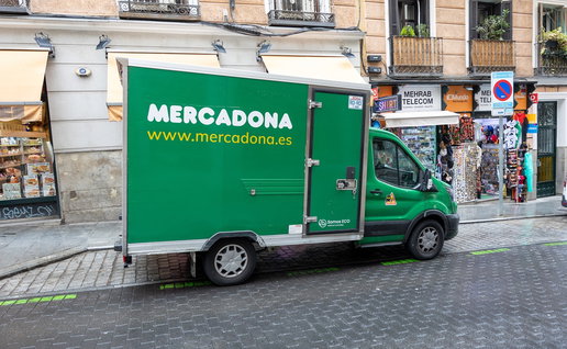 Mercadona delivery van parked outside shops in Spain as the supermarket changes home delivery rules at some stores.