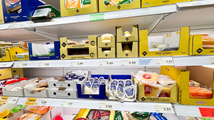 Cheese products displayed on supermarket shelves in Spain following a nationwide Listeria food alert involving fresh cheeses.