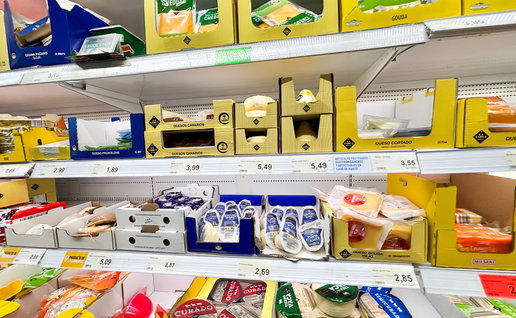 Cheese products displayed on supermarket shelves in Spain following a nationwide Listeria food alert involving fresh cheeses.