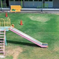 Empty outdoor play area at a preschool during education strike in Ondara