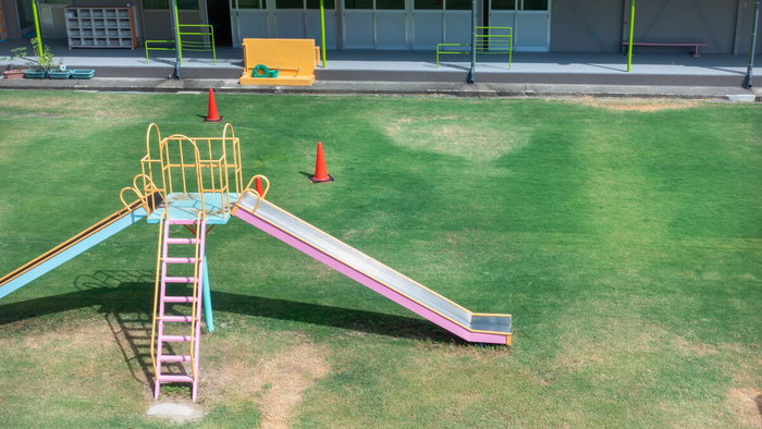Empty outdoor play area at a preschool during education strike in Ondara