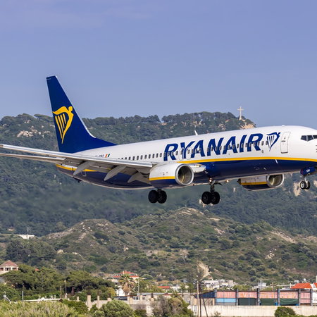 Ryanair aircraft landing in Greece as the airline announces major winter flight cuts and base closures.
