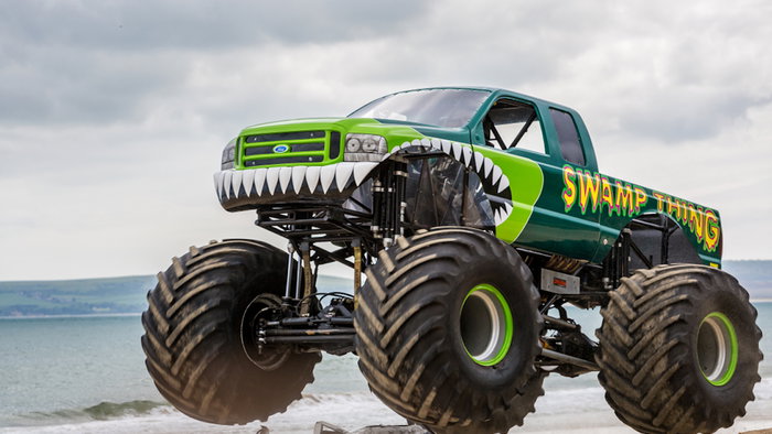 Airborne monster truck at the beach t