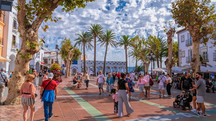 Nerja main square by the church Plaza Balcon de Europa with tourists and visitors