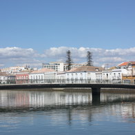 Bridge across the Gilão River in Tavira, Portugal.