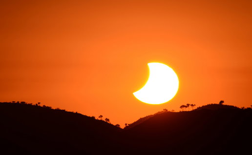 A solar eclipse at sunset