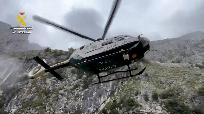 Guardia Civil GREIM mountain rescue searching Picos de Europa mountain range.