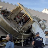Boat rolls right off transport, back into harbour.