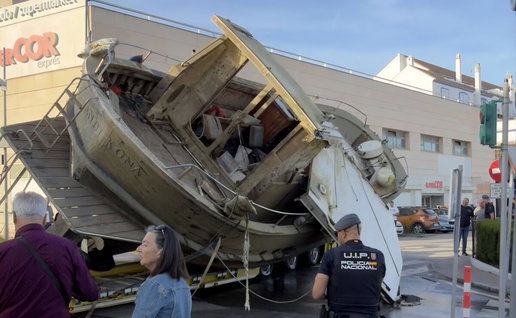 Boat rolls right off transport, back into harbour.