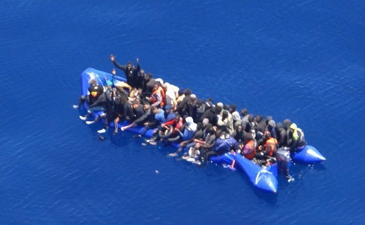 Half-sunk inflatable with 50 migrants.