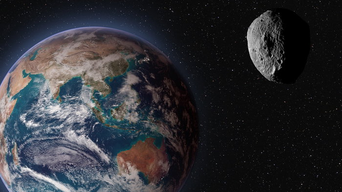 Illustration of Earth in space with a large asteroid passing nearby against a star-filled background.
