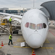 An airplane with a collapsed landing gear