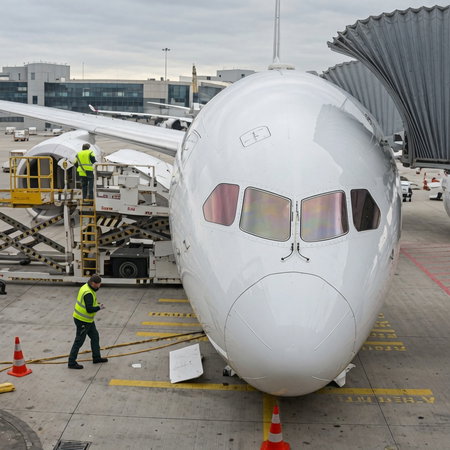 An airplane with a collapsed landing gear