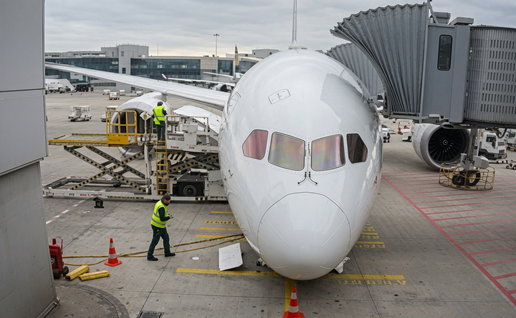 An airplane with a collapsed landing gear