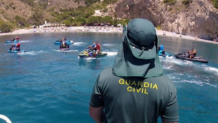 Guardia Civil catch jet ski riders.