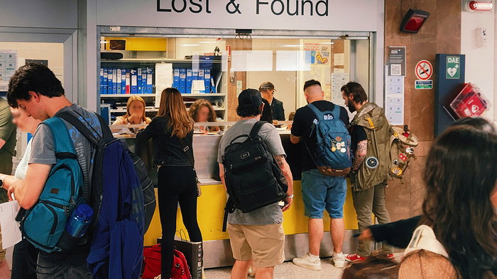 Passengers at the lost and found buggage claim