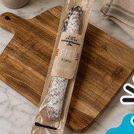 Packaged Can Duran Fuet Extra placed on a wooden chopping board, the product named in Spain’s salmonella food alert