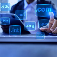 Domain concept with a man touching a .com