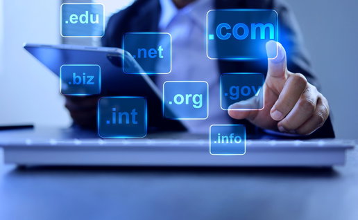 Domain concept with a man touching a .com