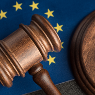 EU flat symbol with a gravel on the top