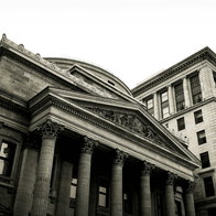 View of a grey finance building in a city