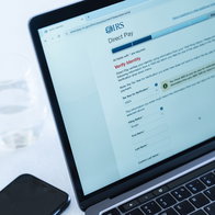 IRS tax payment and verification page displayed on a laptop screen, illustrating US tax filing obligations for American citizens abroad.