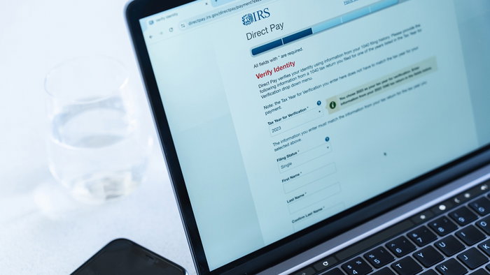 IRS tax payment and verification page displayed on a laptop screen, illustrating US tax filing obligations for American citizens abroad.