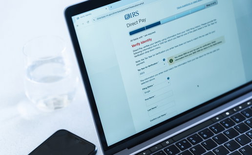 IRS tax payment and verification page displayed on a laptop screen, illustrating US tax filing obligations for American citizens abroad.