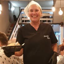 Karen serving up some tasty homemade food at The Sands Bistro in Torrevieja.