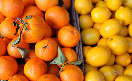 Crates of lemons and oranges.