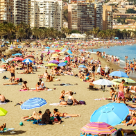 A Malaga beach scape full of people.