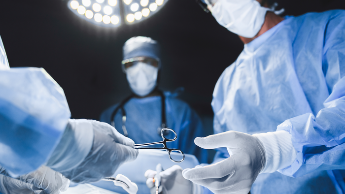 Surgeons in an operating theatre
