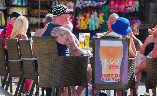 British tourists sitting down at a terrace bar in Tenerife