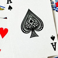 Playing Cards on a table all scattered