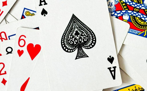 Playing Cards on a table all scattered