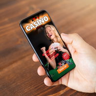 Man viewing online casino on his mobile phone