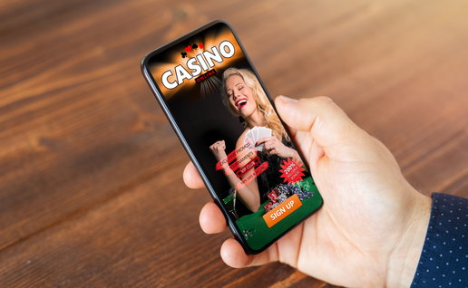 Man viewing online casino on his mobile phone