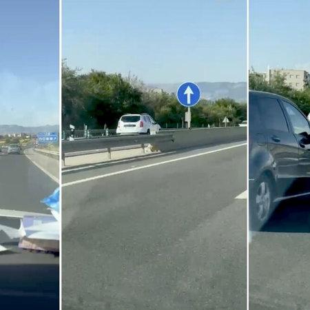 White Dacia Duster heading the wrong way.