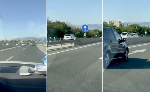 White Dacia Duster heading the wrong way.