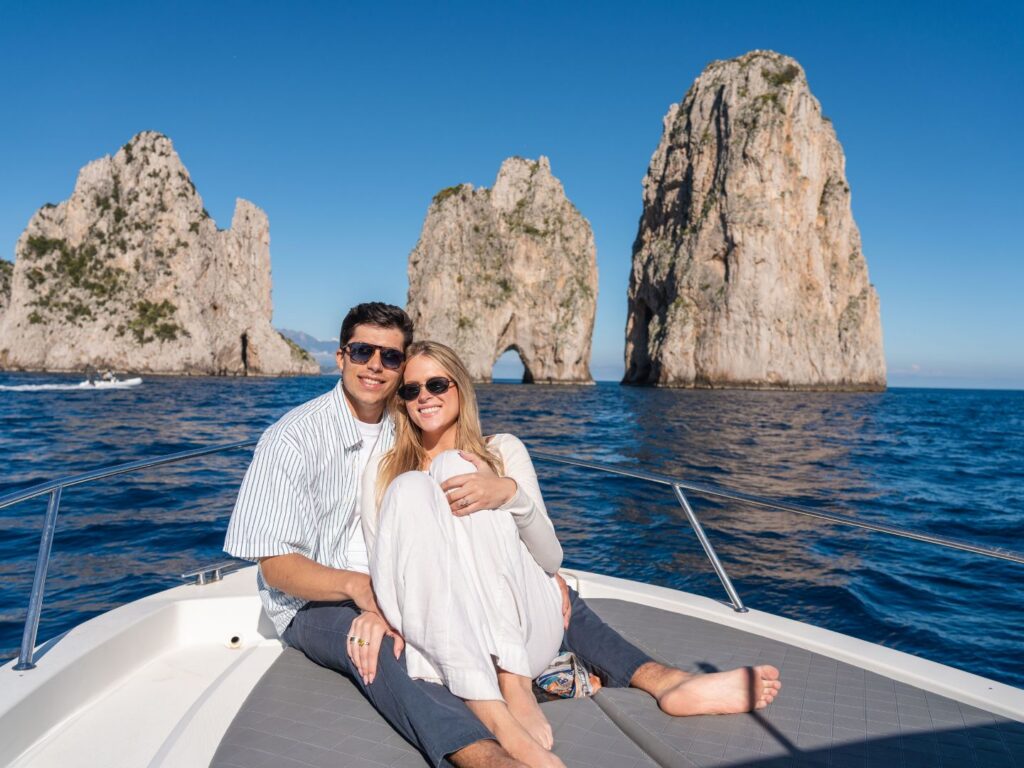 Couple of a boat tour with a View of the Island of Capri