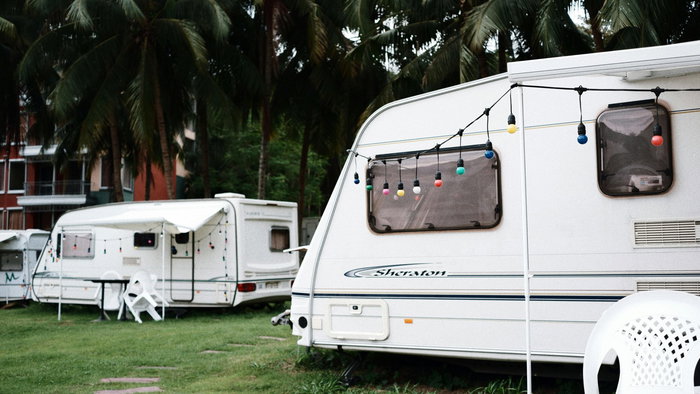 View of caravans parked up in a field