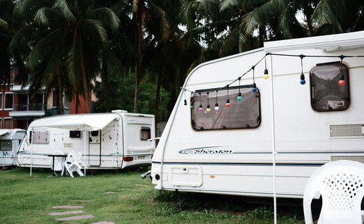 View of caravans parked up in a field